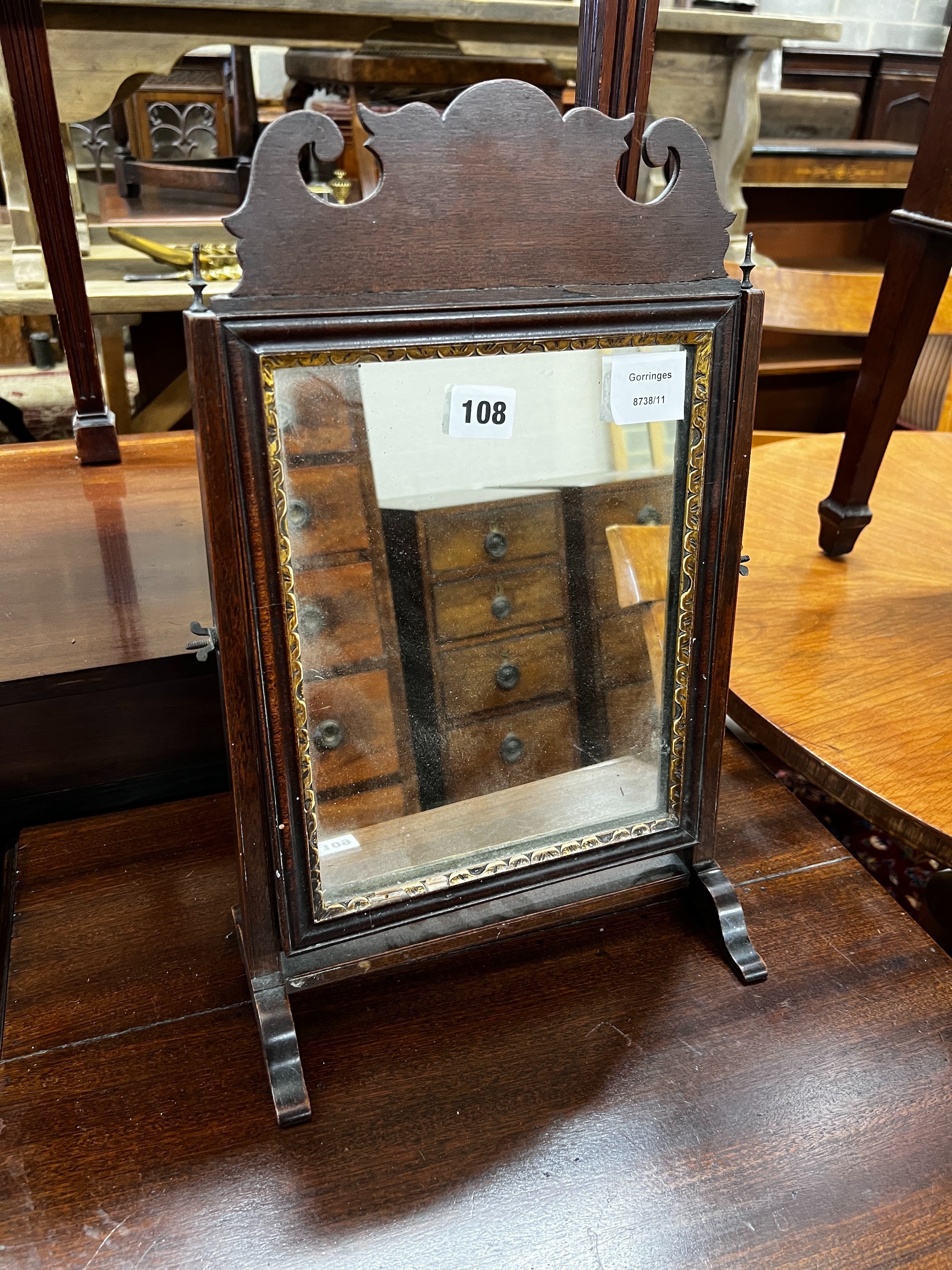A George III mahogany swing frame toilet mirror, height 43cm